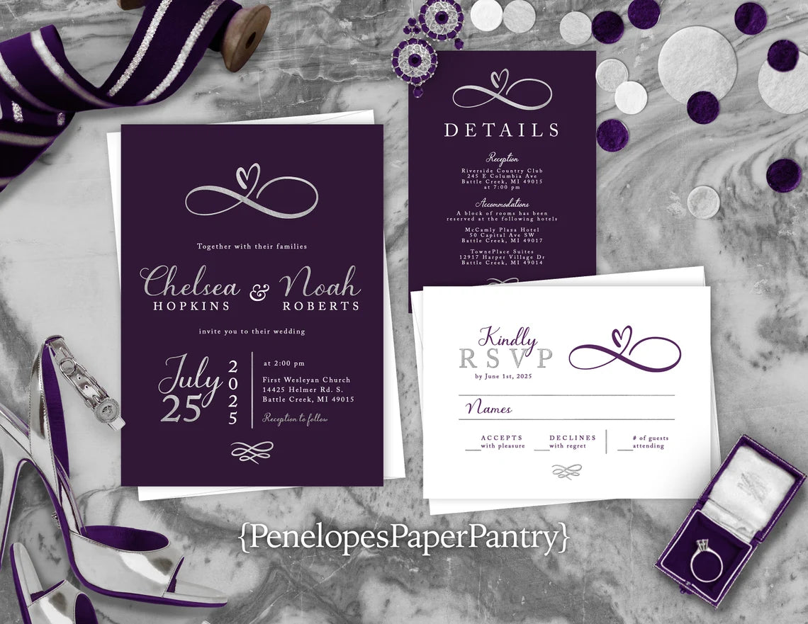 a purple and white wedding suite with purple ribbon