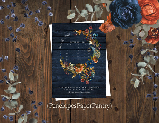 Navy, Burnt Orange Floral Wreath with Calendar and Navy Wood Background Save the Date